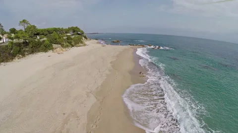 Flight and takeoff over seaside with waves. France, Corsica. Aerial view. Vídeo Stock 47380390