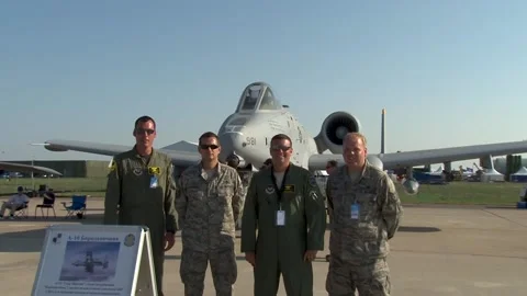 Flight and technical staff in front of American attack aircraft A-10 Thunderbolt Stock Footage 208349333