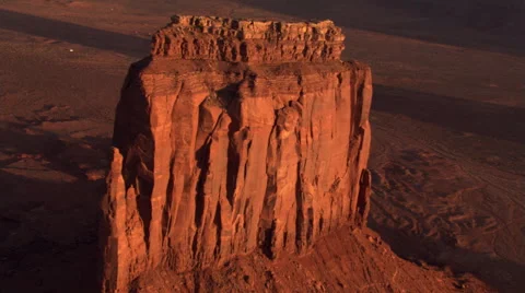 Flight approaching and partially orbiting Monument Valley's East Mitten Butte Stock Footage 59526018