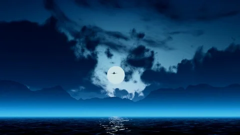 The flight of an approaching plane in a dramatic blue sky. Stockbeeldmateriaal 128954428