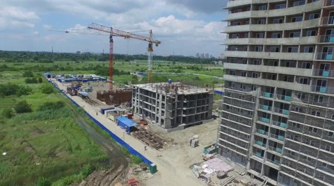 Flight around buildings under construction in Krasnodar Stock-Footage 58911069