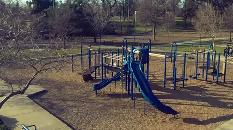 Flight around the children's swing Stock Footage 35728403