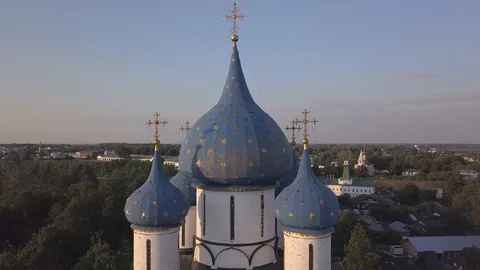 Flight around domes of the Cathedral of the Nativity of the Virgin in Suzdal Stock Footage 94080190