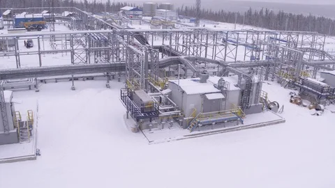 Flight around gas compressor on field 動画素材 123766224