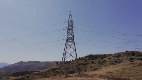 Flight around high voltage pole Stock Footage 246378910