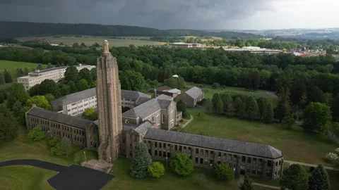 A flight around the parameter of a stone church in Danville, Pennsylvania Stock Footage 242886103