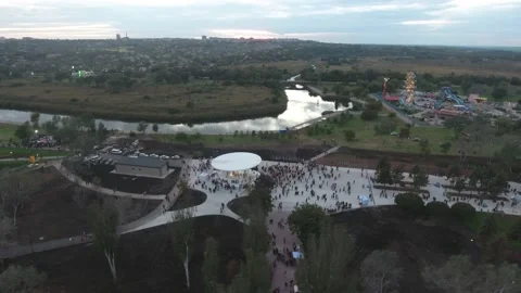 Flight around scene over the park and rest in peaceful Mariupol Stock Footage 238758019