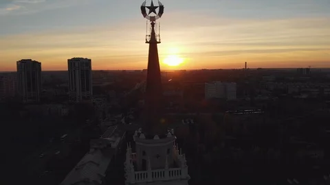 Flight around Soviet star on top of tower of old building in Voronezh city Stock Footage 107873567