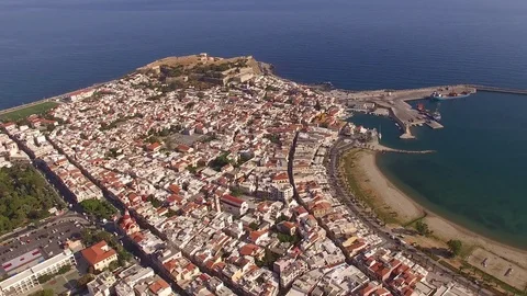 Flight around of Three Blue Domes church in Oia town on Santorini island, Greece Stock Footage 120869887
