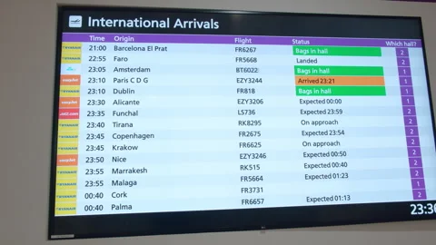 Flight arrivals update board at Edinburgh Airport showing various schedules.. Video stock 301871679