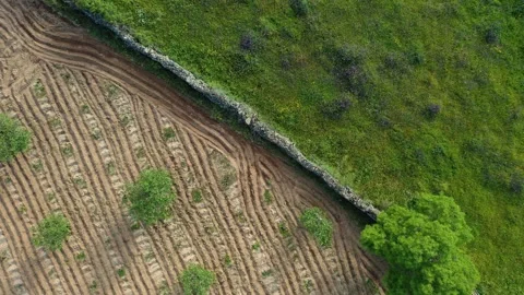 Flight ascending and rotating at the same time with a drone seeing two Stockbeeldmateriaal 279106502