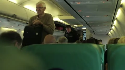 Flight attendant prepare for take off Stock Footage 12379854