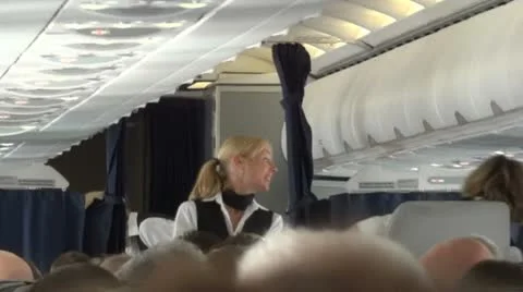 Flight Attendant Working In a Airliner - Serving Food Stock Footage 11398278