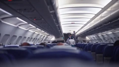 Flight attendants get ready for a flight Stock Footage 247118578