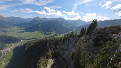 Flight on the Austrian Alps. Drone FPV. Rocks and trees. Stock Footage 162023305