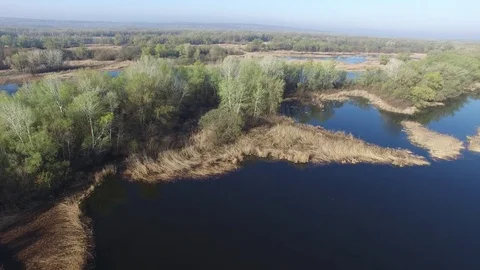 Flight backward over the islands in the midst of flood a big river 스톡 동영상 74489485