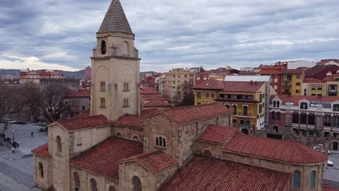 Flight backwards away from San Pedro Church in Gijon. Asturias. Spain Video stock 152770086