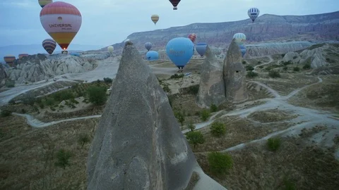 The flight of balloons at dawn over the valley Stock Footage 102462187
