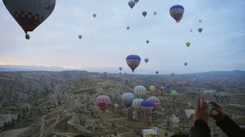 The flight of balloons at dawn over the valley Stock Footage 102462225