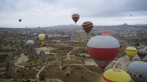 The flight of balloons at dawn over the valley Stock Footage 102462438