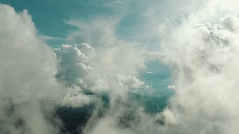 The flight in beautiful clouds above mountains Stock-Footage 116056721