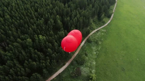 Flight of behind hot air balloon in shape of heart 스톡 동영상 59592846