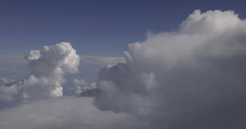 Flight between the clouds, 4K Stock Footage 221274869