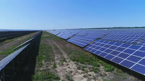 The flight between the rows of solar panels Stock Footage 153353626