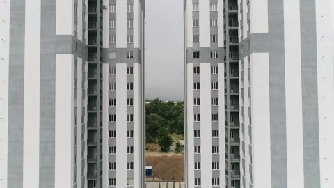 A flight between two high-rise buildings Stock Footage 154898697