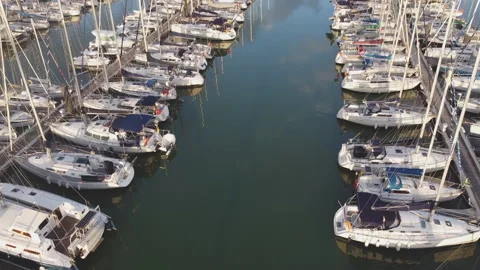 Flight between yachts in the marina Stock Footage 165978205