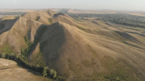 Flight with bird of prey over bald steppe mountains. Orenberg, South Ural Video stock 155999096