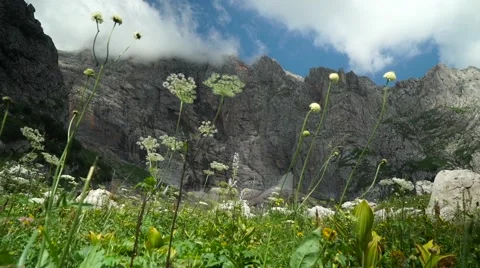 Flight of the Camera Along a Stone Against High Mountains and the Blue Sky Video stock 66277095