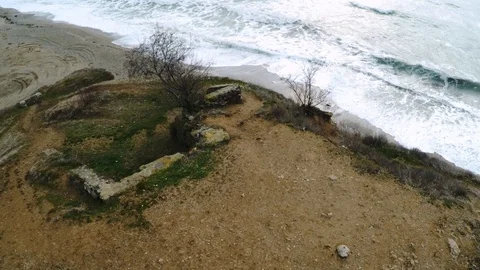 Flight of the camera from the hill to the surf Stock Footage 91396566