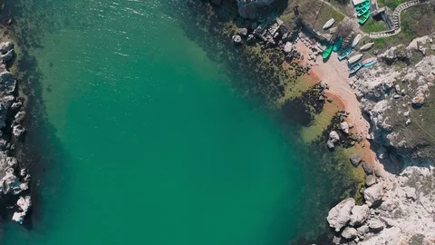 Flight of the camera over the amazing bay with cliffs and a sandy beach Stock Footage 126682391