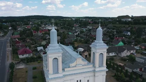 Flight of the camera over the Catholic Church in Eastern Europe. Video stock 137719153
