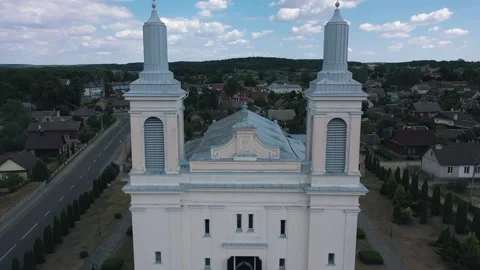 Flight of the camera over the Catholic Church in Eastern Europe. Video stock 138584401