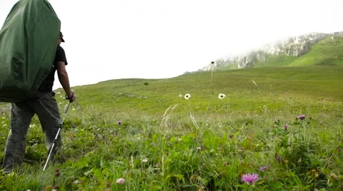 Flight of the Camera Over a Mountain Footpath Towards to a Wide Canyon Stock Footage 66277989
