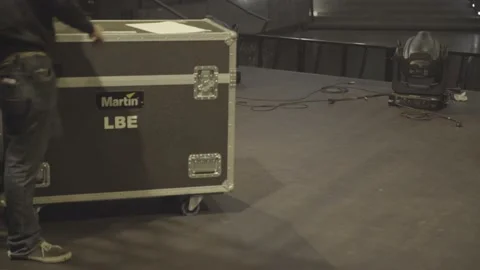 Flight cases being moved during production Stock-Footage 137309131