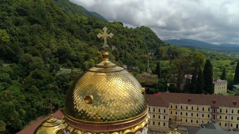 Flight close cross dome New Athos Monastery Abkhazia attraction church Caucasus  Stock Footage 128621476