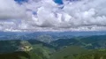 The flight in the cloud stream above picturesque mountains. Hyperlapse 4k or 4k+ Resolution