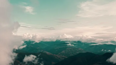 The flight in clouds above beautiful mountain landscape Stock Footage 116058035