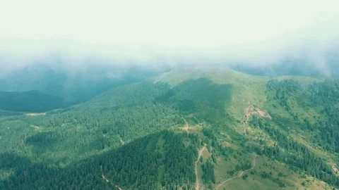 The flight in clouds above the beautiful mountain Video stock 116063951
