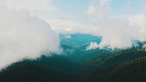 The flight in clouds above mountain forest Stock-Footage 116057348