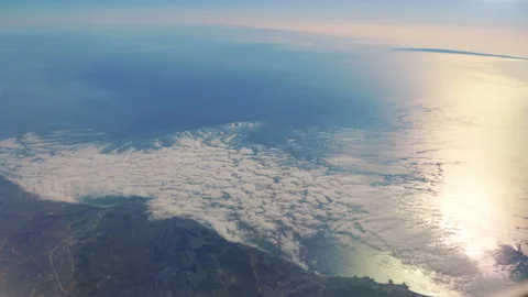 Flight in the clouds above the ocean in 4K Video stock 112339305