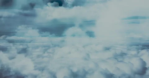 Flight in the clouds during the day Stock Footage 169961803
