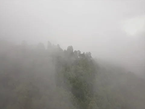 Flight Into Clouds Past Mountain Edge Видео 81314695