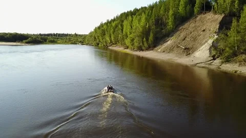 The flight of the copter after the boat. General plan. Stock Footage 256184390