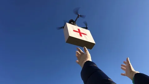 Flight of copter with first aid package. | Stock Video | Pond5