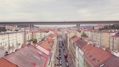Flight on a copter over the red roofs of Prague (15) Stock Footage 117336255