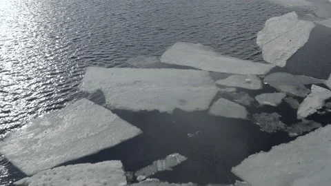 The flight of the copter over the river opened from the ice Stock-Footage 155184170